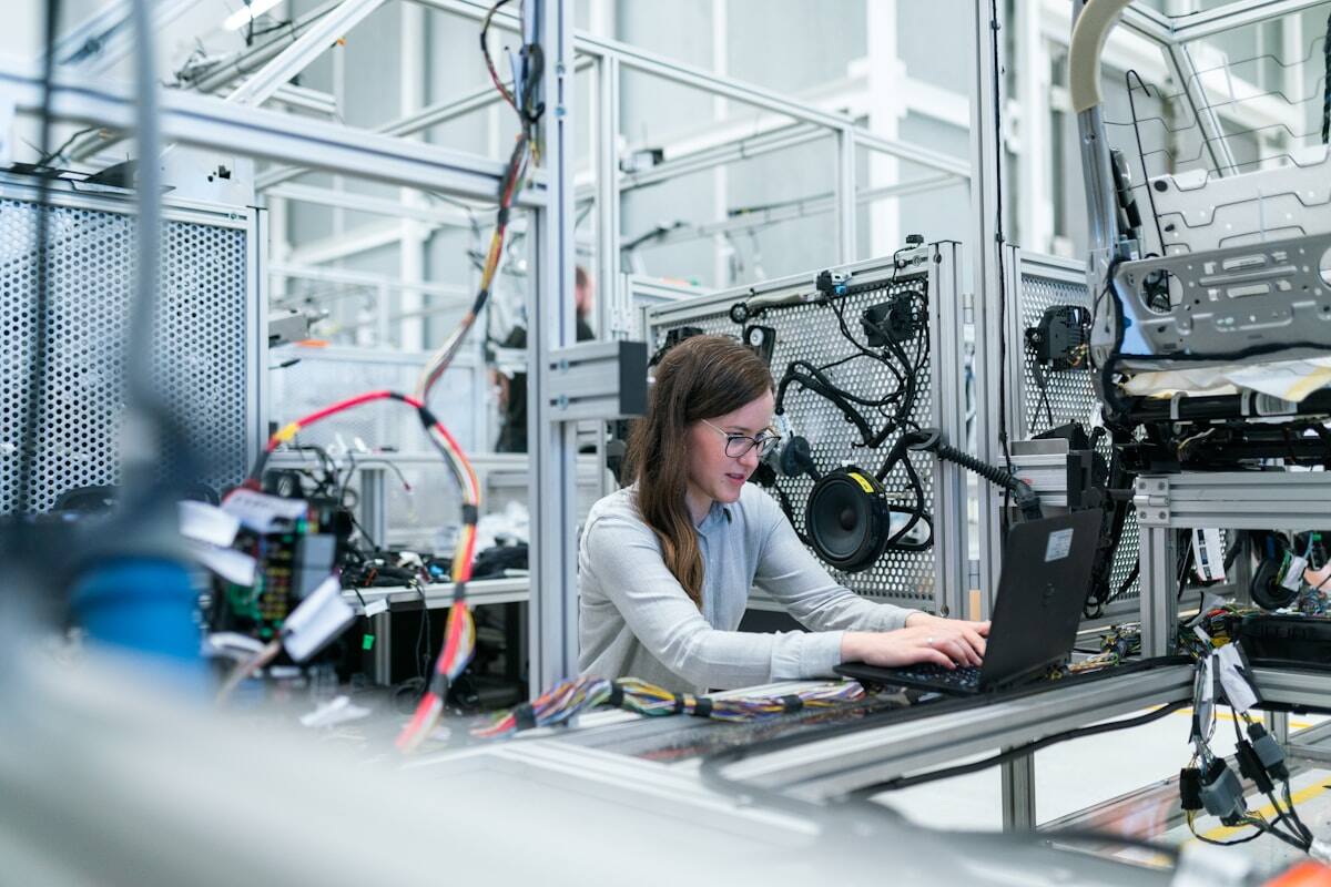 Modern manufacturing line with engineer — D365 F&O tenant on Novacare