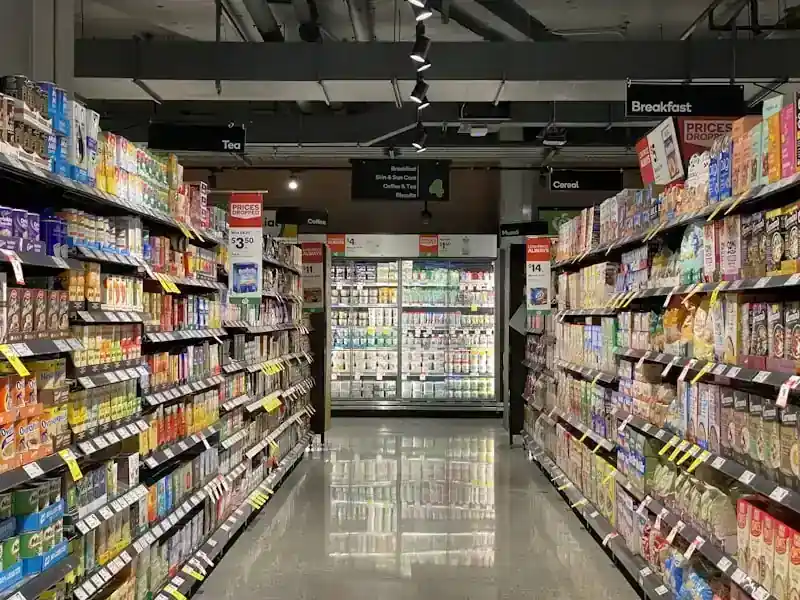 Grocery and FMCG distribution — supermarket aisle showing wholesale supply to retail chains